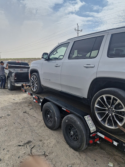 Servicio de grúa, taller mecánico y desponchado.